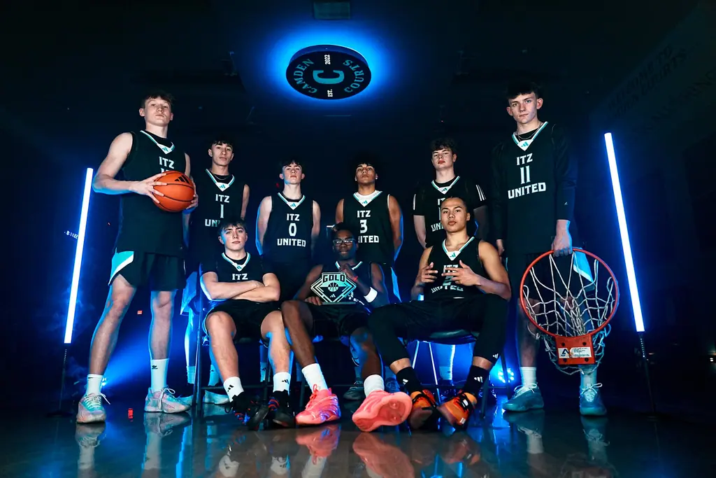 Team portrait under blue gym lighting