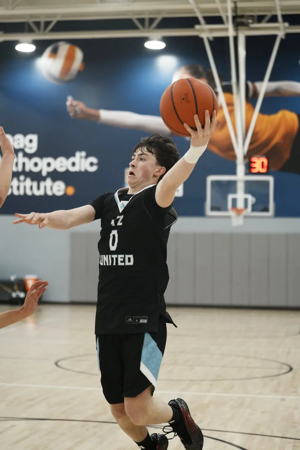 Player releasing a shot in competition