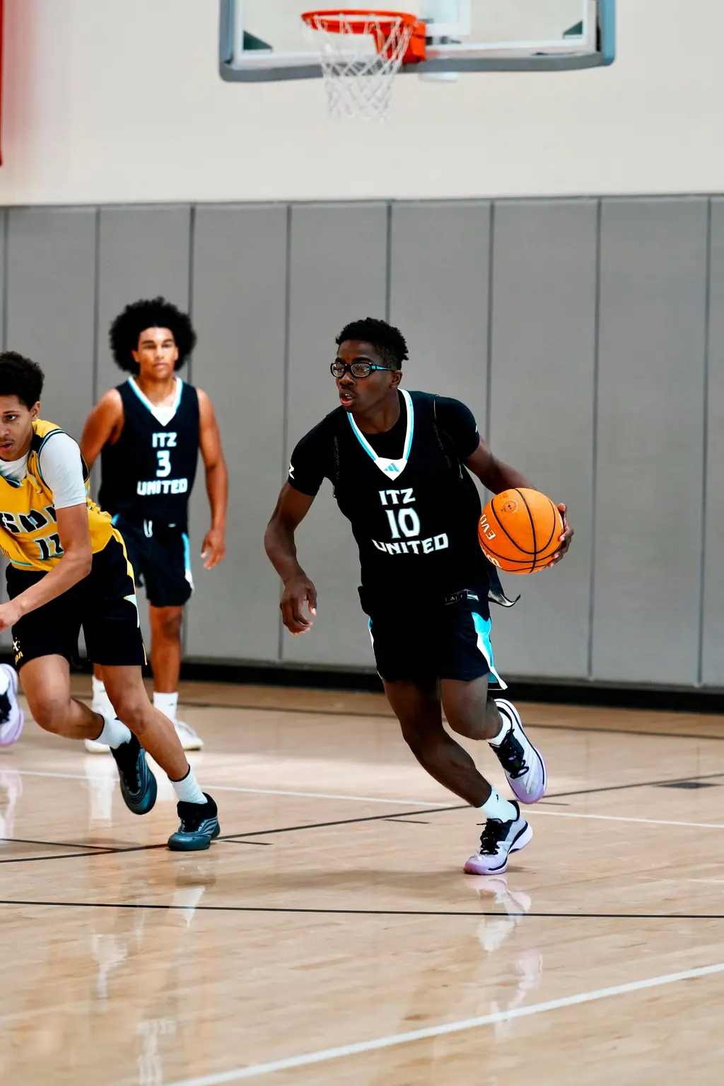 Player driving with the ball in competition