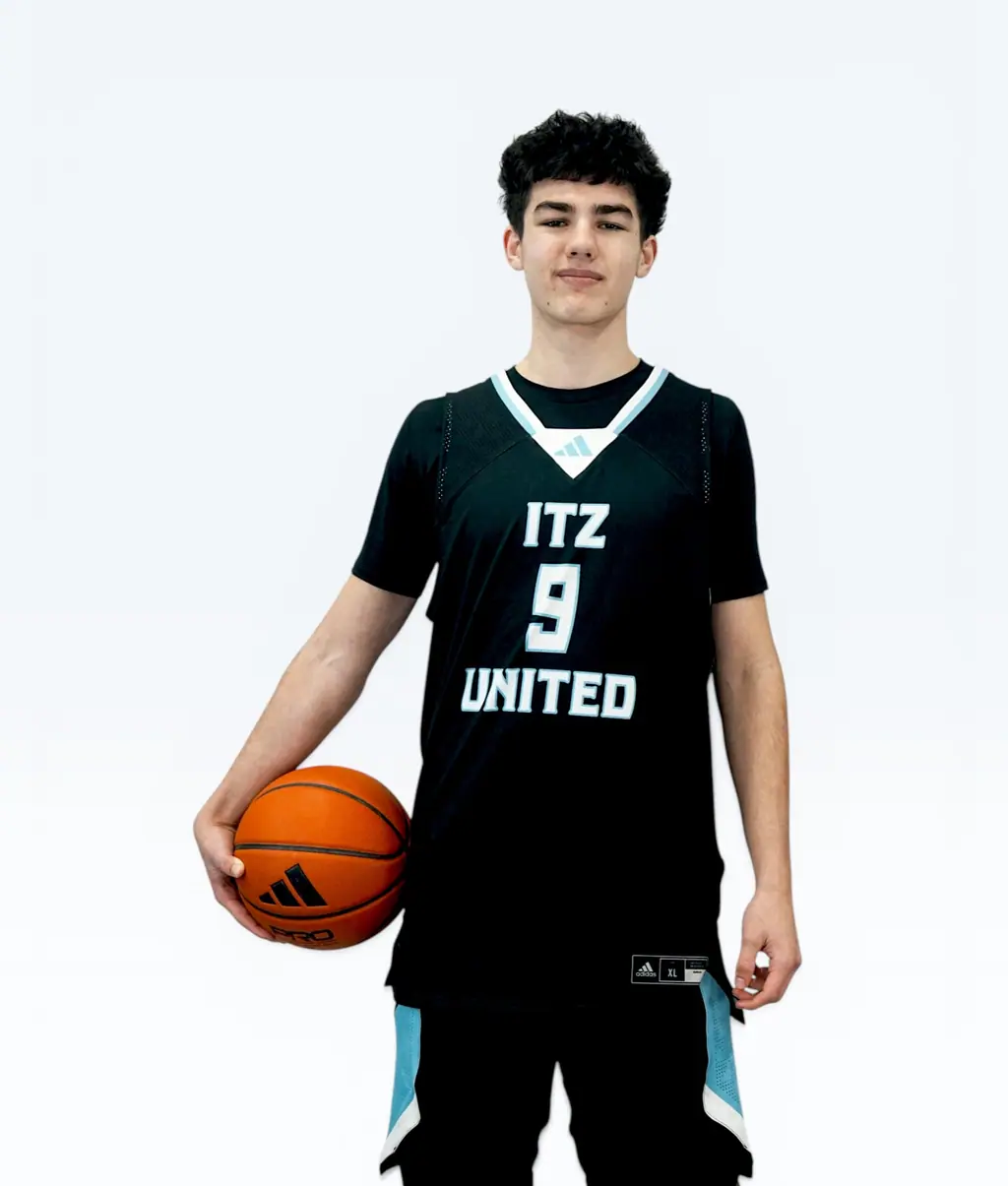 Player holding a ball, jersey 9
