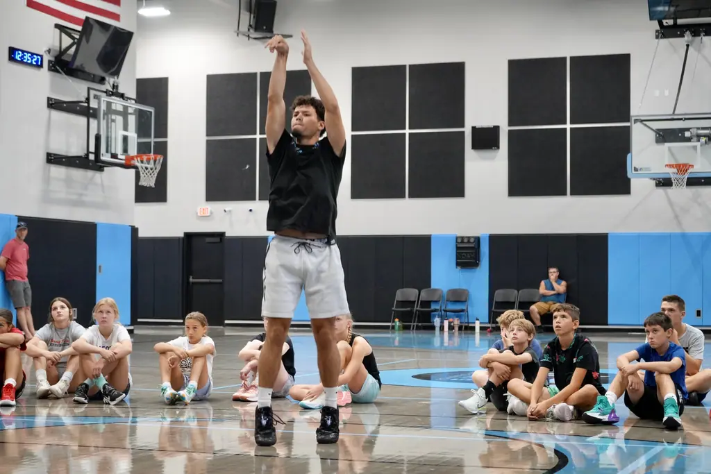 Shooting demonstration with players watching