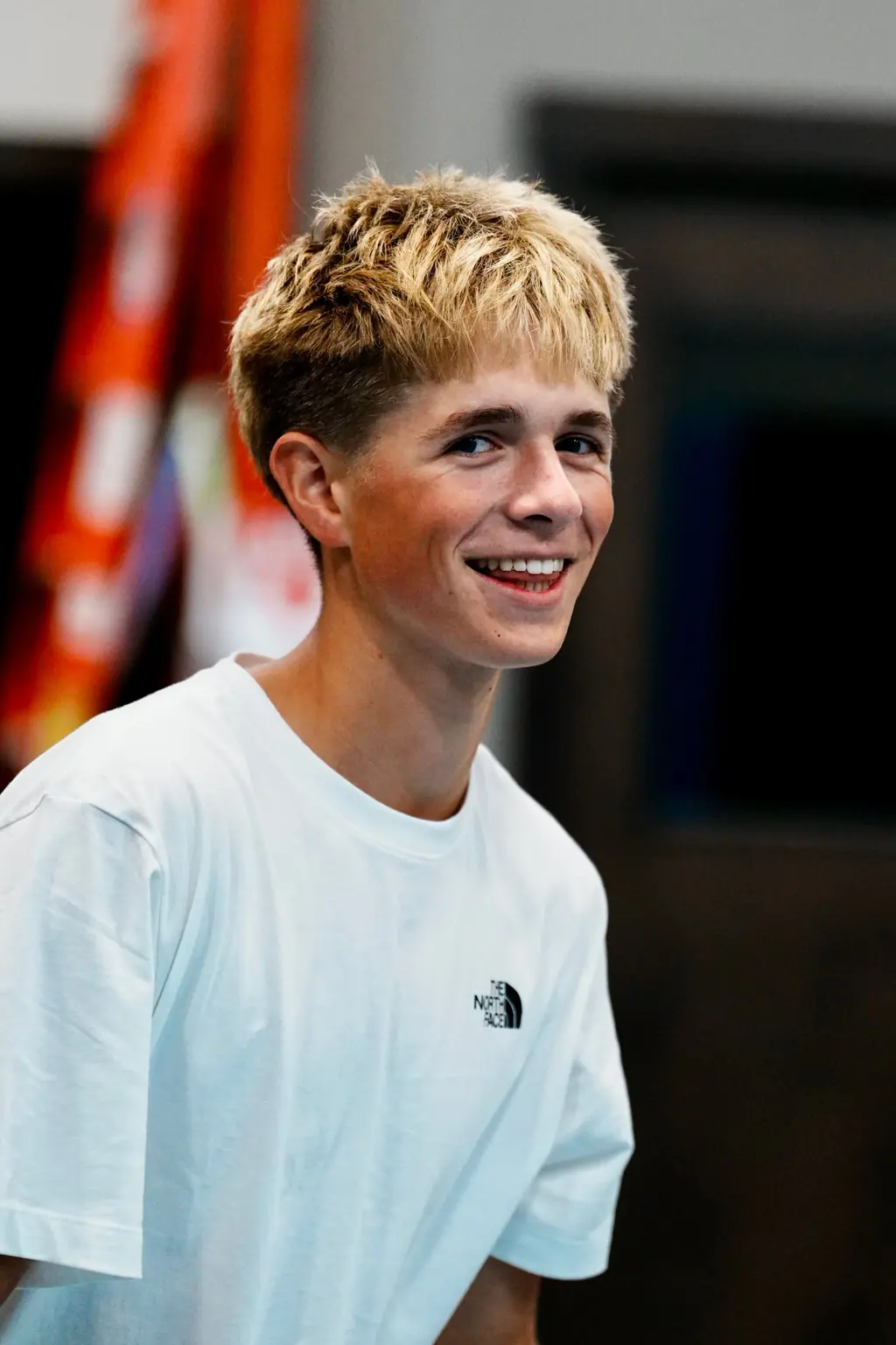 Smiling player courtside